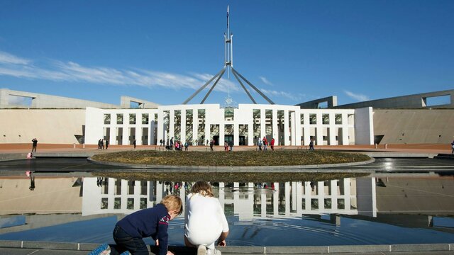 Australia's Parliament House Children looking in the pond