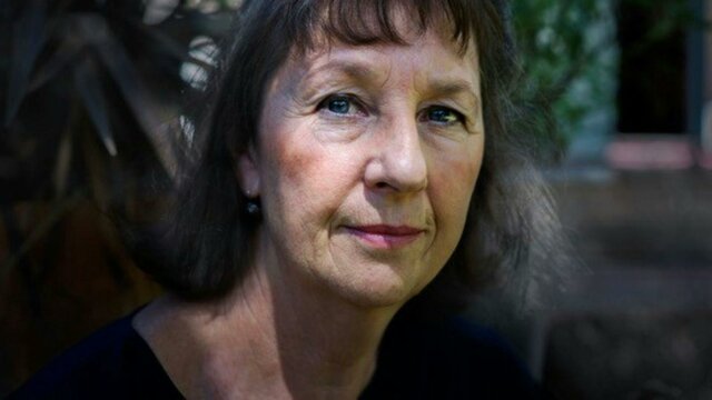 Rosalie Ham A close up image of a woman with long dark hair and a fringe