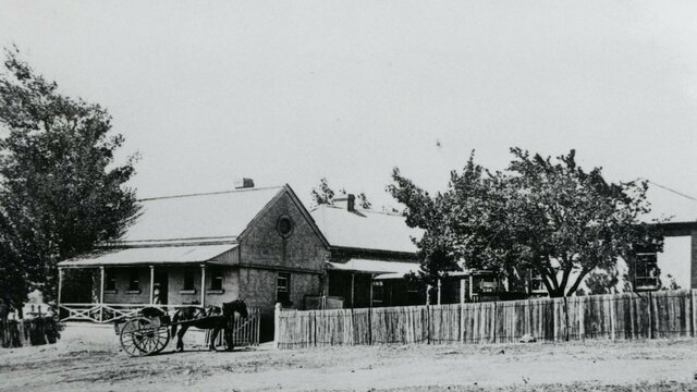 Queanbeyan Hospital , Rusten House. Bill Hopkins Collection. 1862 Stone building with nurse on a verandan and horse and cart in front