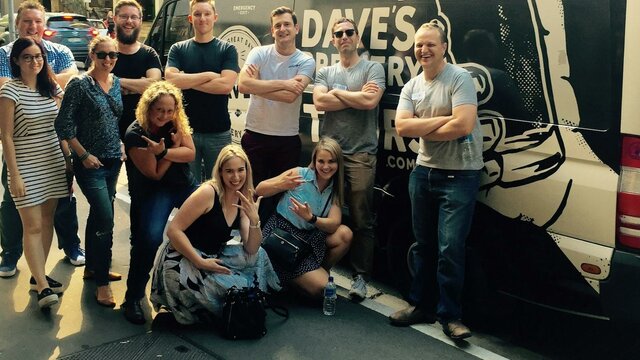 Hop on the bus to explore the best of Canberra Beer Beer tour participants in front of the Dave's Brewery Tour bus