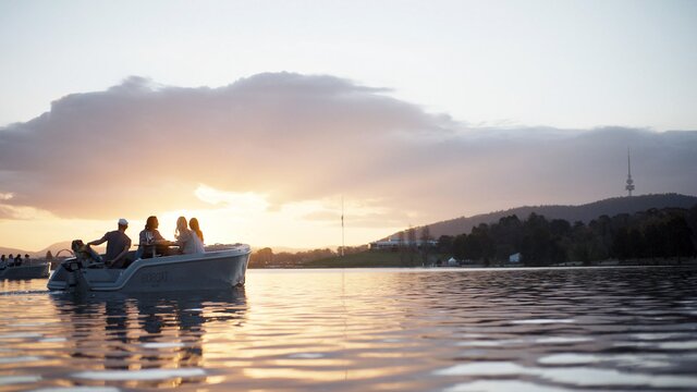 A group of friends enjoying their time on a GoBoat on the lake.