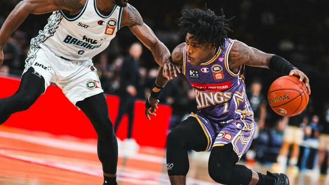 Sydney Kings Sydney Kings player and opponent on court