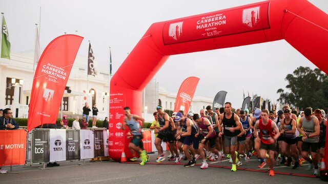 Participants crossing the start line