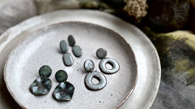 A plate of two pairs of ceramic earrings